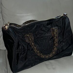 Black and brown speedy bag